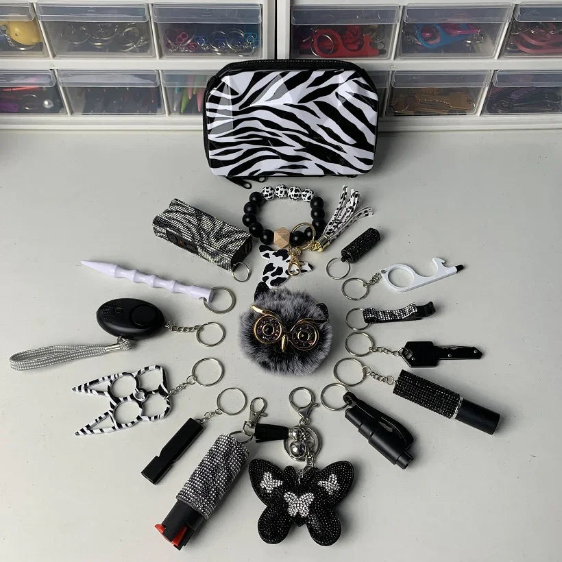 shiny black handbag safety keychain set with self defense tools