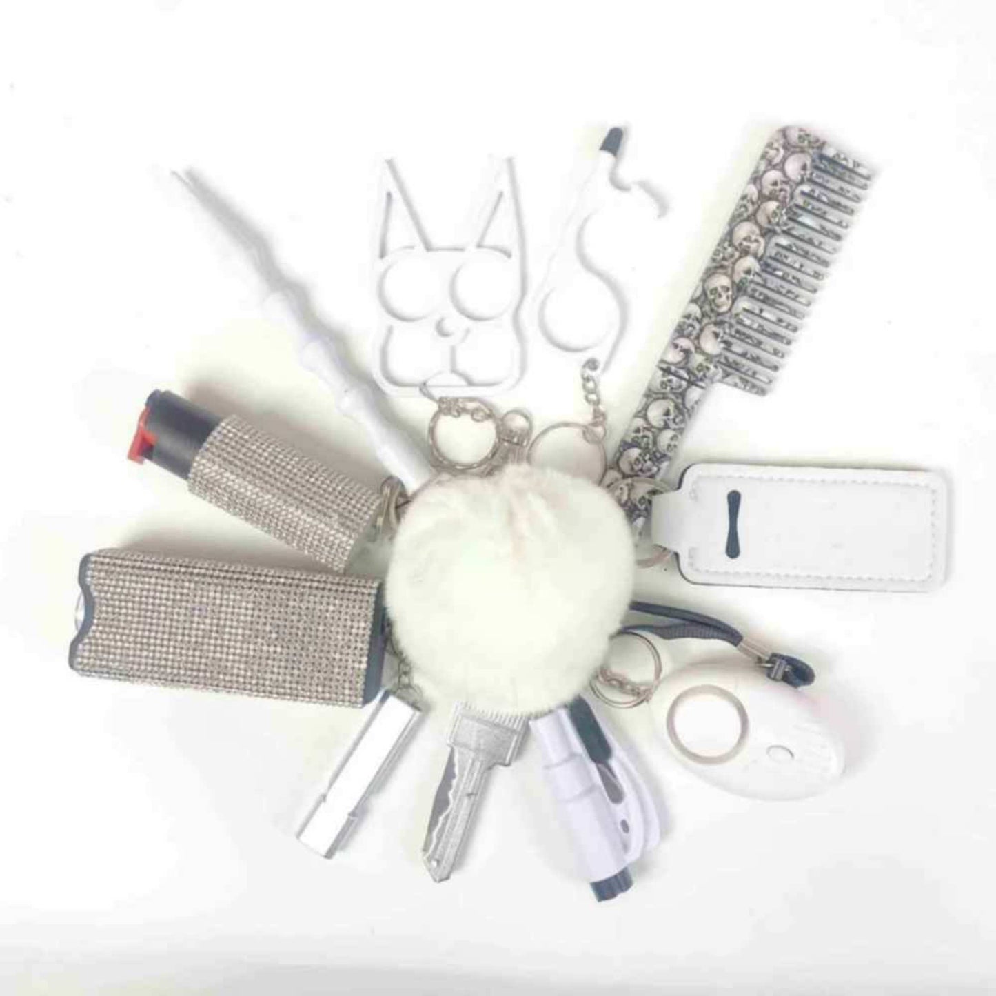 personal safety keychain set with multiple self-defense tools in white