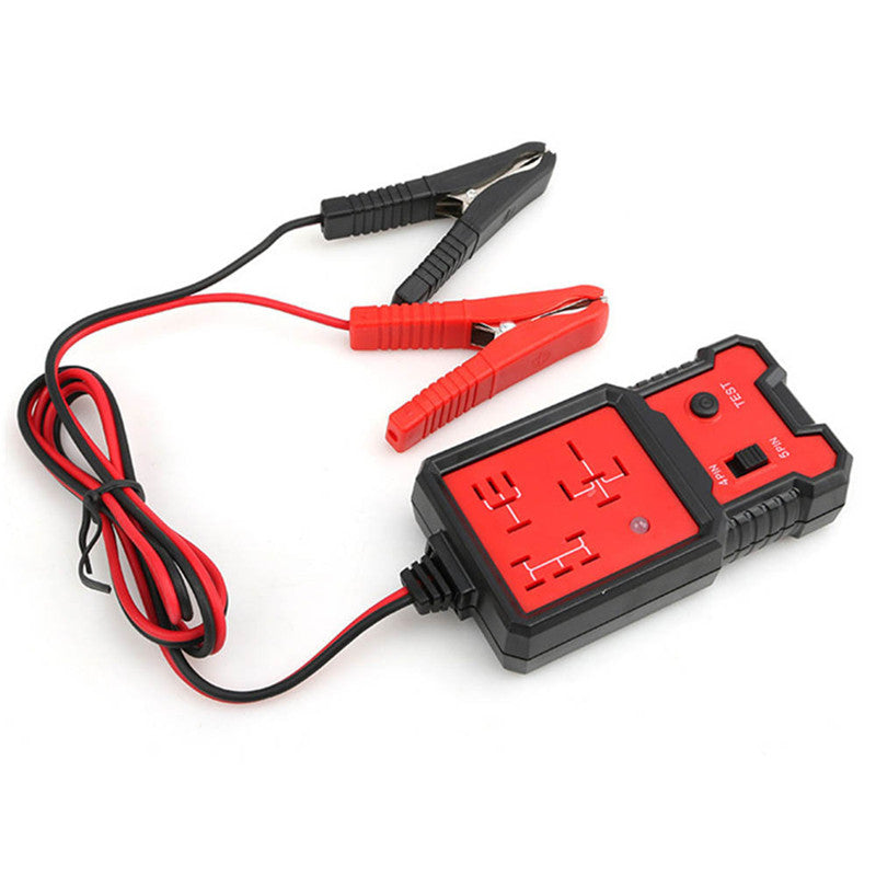 Red and black jump starter with clamps on a white background