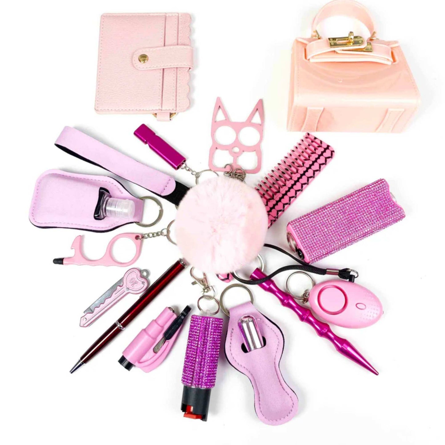 front view of 19-piece personal safety keychain for women in light pink