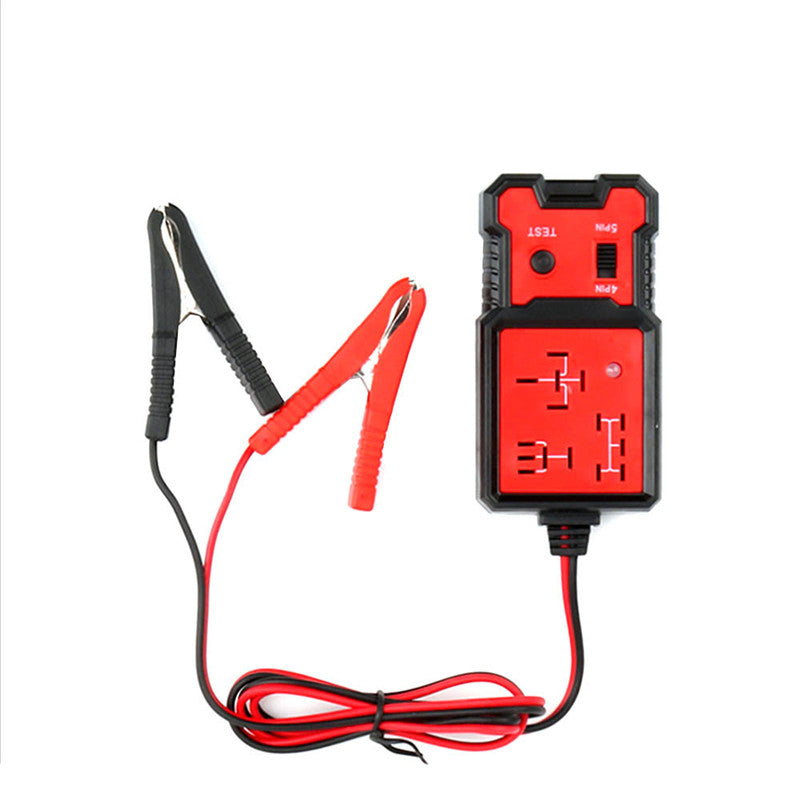 Red and black battery charger with clamps on a white background