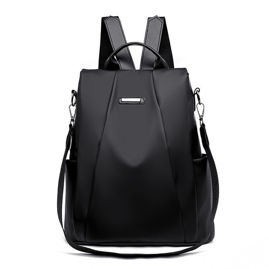Black anti theft travel backpack on a white background