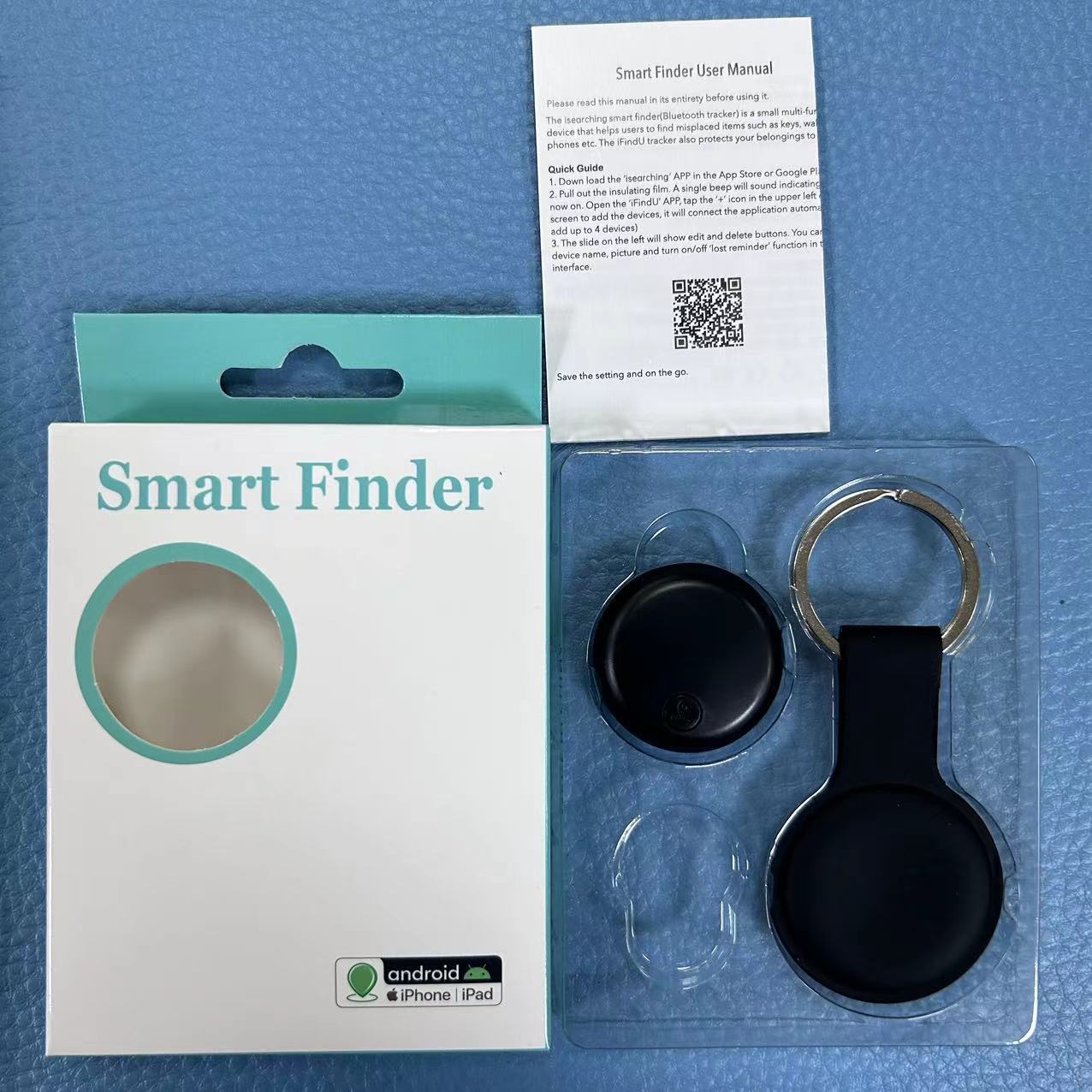 Smart anti-loss Bluetooth tracking device with packaging, keychain, and user manual on a blue background