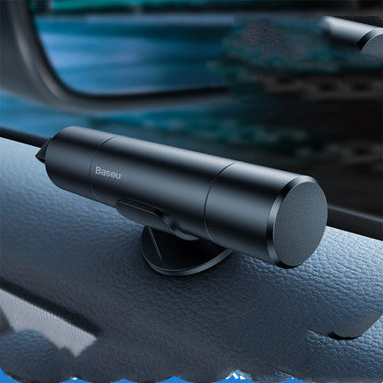 Black car mount device on a car dashboard with 'Baseus' branding.