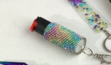 Decorative pepper spray with colorful bead design and keychain attached