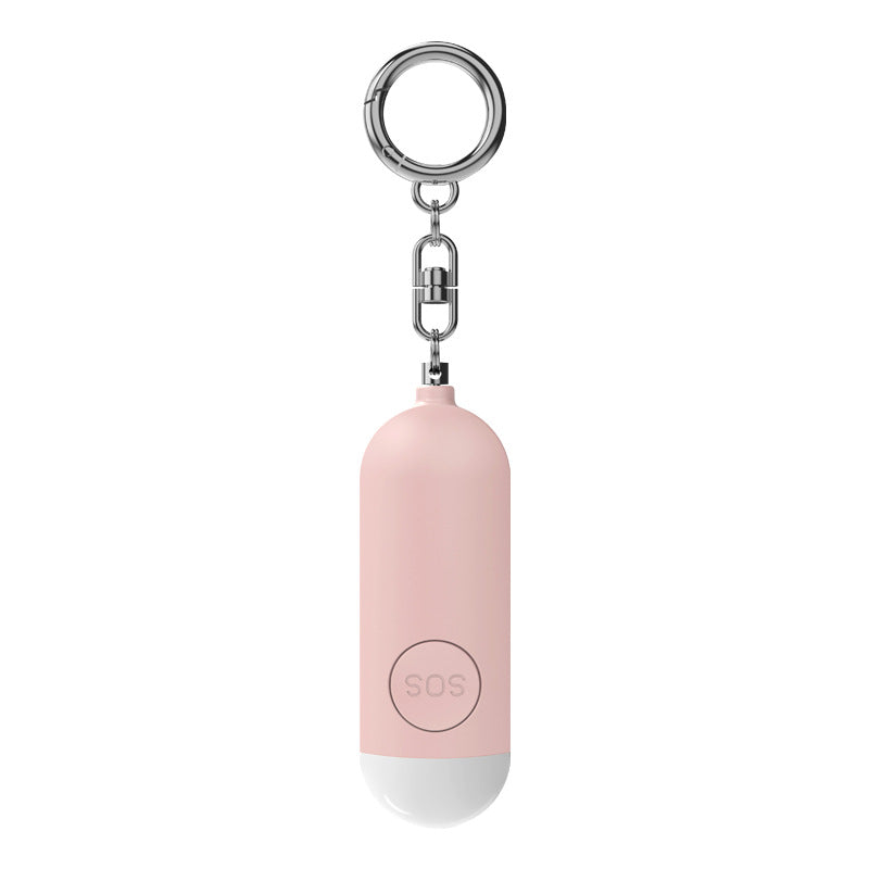 Portable personal alarm 130dB with flashlight feature designed for visibility and self-defense in low-light situations.