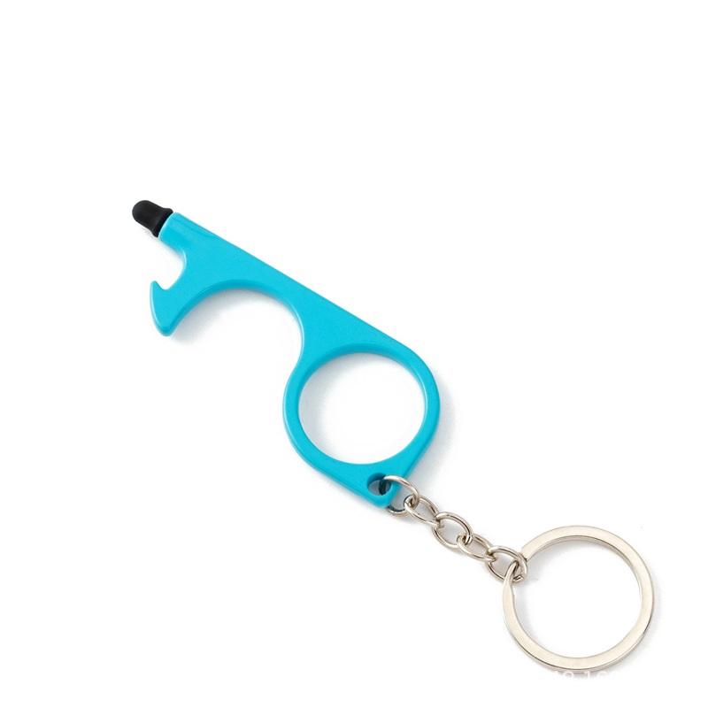 Hygiene keychain with a black and silver tool on a white background