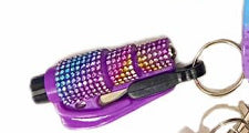 Multicolored window breaker keychain with a small tool or device attached