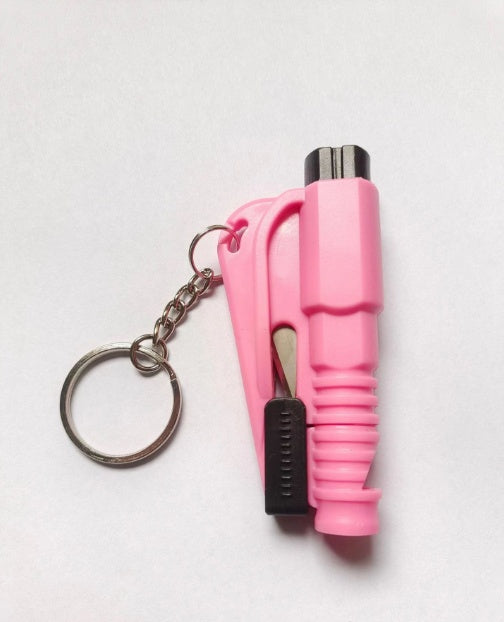 Pink window breaker keychain with a tool on a white background
