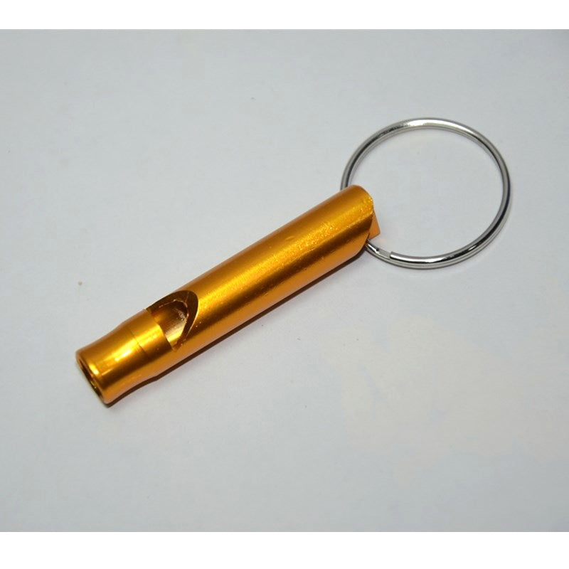 Orange-colored rescue whistle with a key ring on a white background