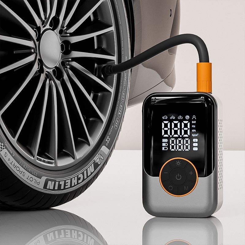 Portable Tire Air Compressor with Michelin tire in the background