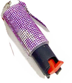 Purple and black object with rhinestone embellishments on a white background