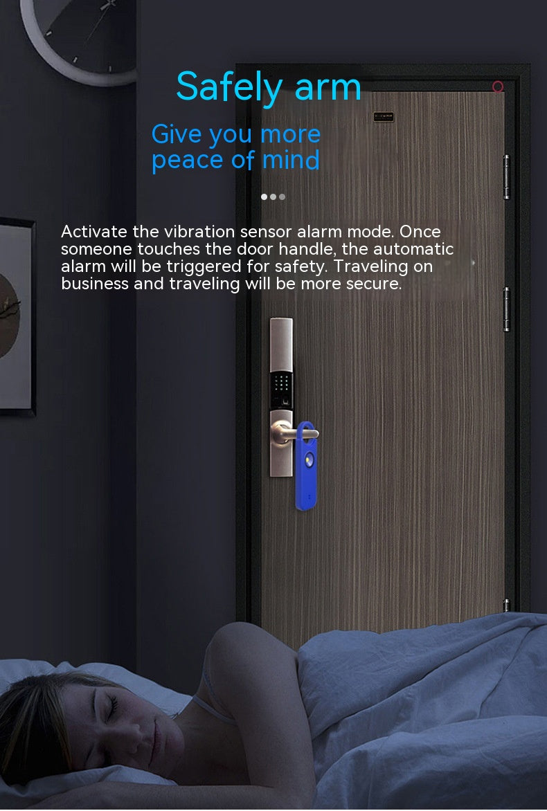 Door with safety alarm feature activated, showing a person sleeping in the foreground.