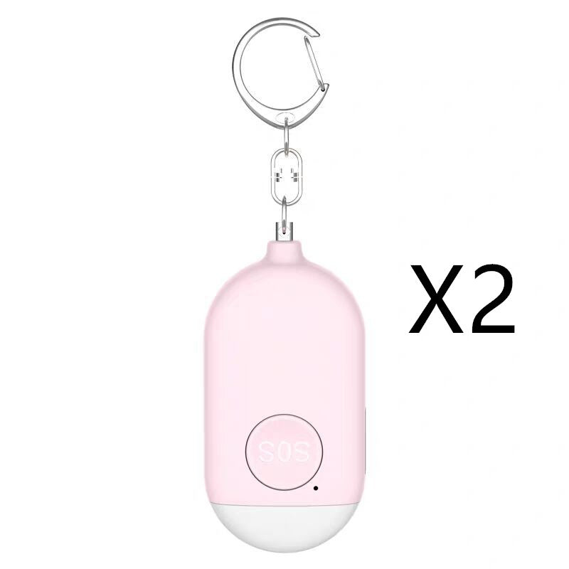 Pink keychain device with a white base on a white background, labeled 'X2'.