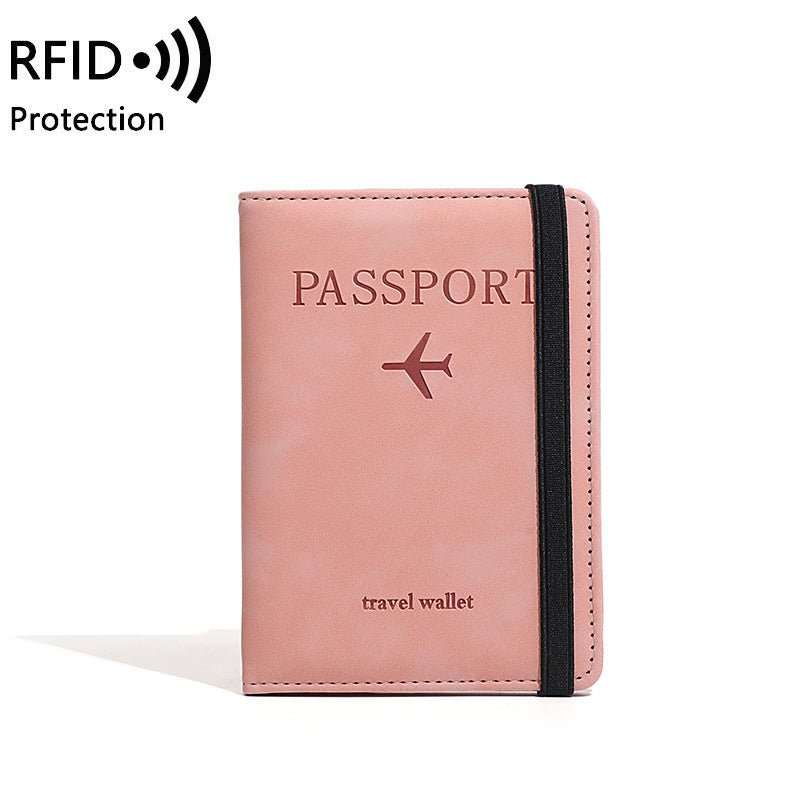 Pink passport travel wallet with 'RFID Protection' text on a white background