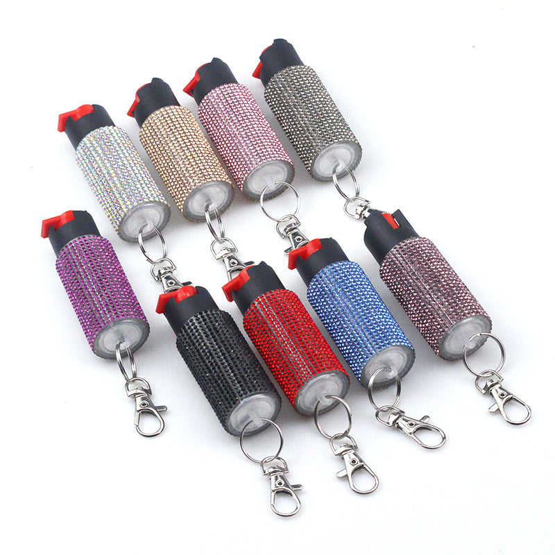 Rhinestone pepper spray for women attached to a personal safety keychain