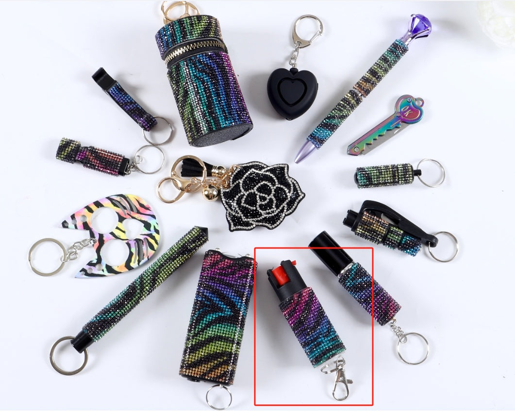 Collection of colorful keychains and accessories on a white background