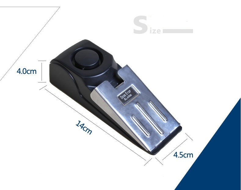 compact travel safety door alarm placed under door