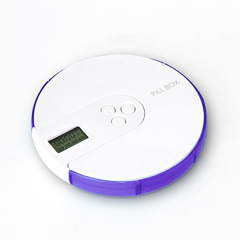 Compact pill organizer with alarm clock and countdown timer