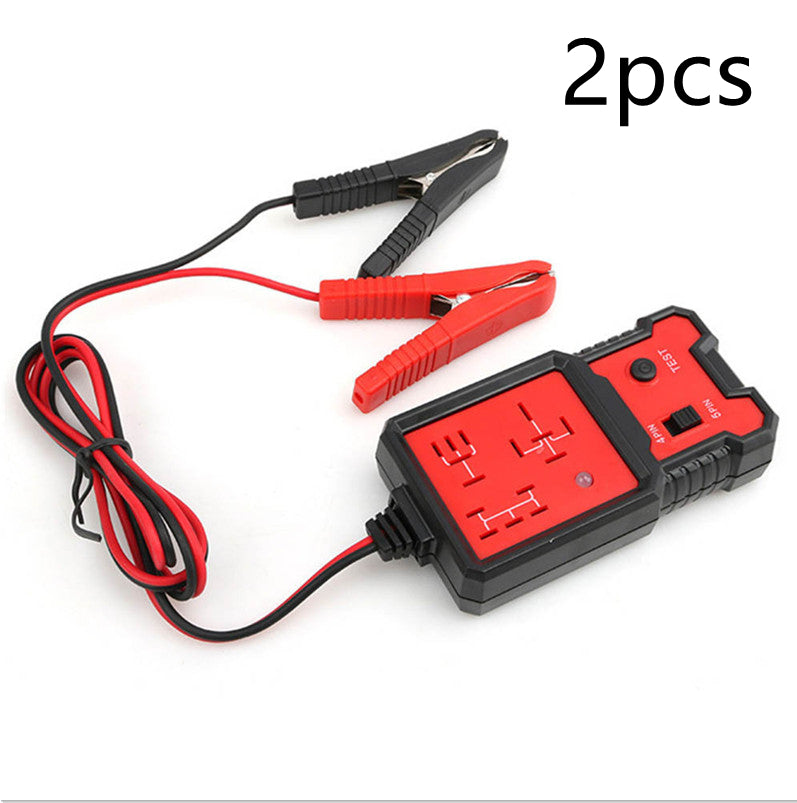 Red and black battery charger with clamps on a white background, labeled '2pcs'.